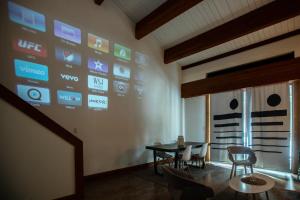 a dining room with a table and chairs on a wall at One BDR at Northstar Walk to Village in Truckee