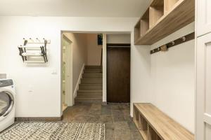 a laundry room with a washer and dryer at North Lake Tahoe Cabin and Hot Tub in Tahoe City +29 photos