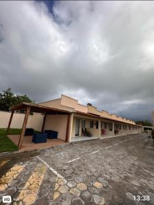 a large building with a lot at DUNAS RESIDENCE CASA 14 in Santo Amaro