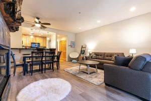 a living room with a couch and a table at 2BDR Three Minutes to Olympic Valley in Tahoe City