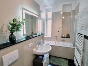 Koupelna v ubytování Apartment OTTO II - Erfurt Zentrum + 38 fotografií