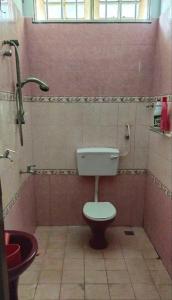 Ванная комната в Sobey Laris Homestay Pasir Mas Town
