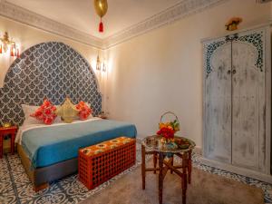 Postel nebo postele na pokoji v ubytování Riad dada Messouda spa