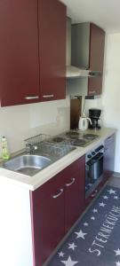 Kuchyň nebo kuchyňský kout v ubytování Ferienwohnung an der Zuckerstraße + 8 fotografií