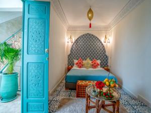 Postel nebo postele na pokoji v ubytování Riad dada Messouda spa