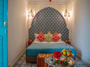 Postel nebo postele na pokoji v ubytování Riad dada Messouda spa