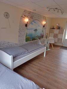 Postel nebo postele na pokoji v ubytování Ferienhof im grünen Herzen