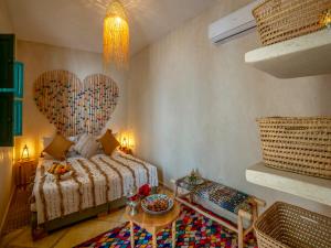 Postel nebo postele na pokoji v ubytování Riad dada Messouda spa