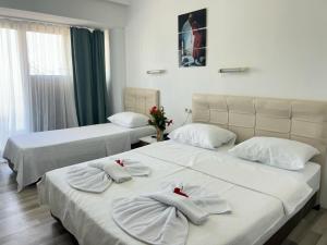 Tempat tidur dalam kamar di Yıldırım Otel