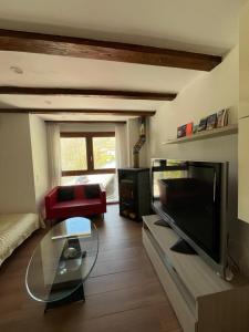 TV a/nebo společenská místnost v ubytování casa ciliegio