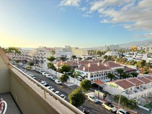 arial view of a city with cars and buildings at Comfortable apartment in the heart of Las Americas in Playa de las Americas