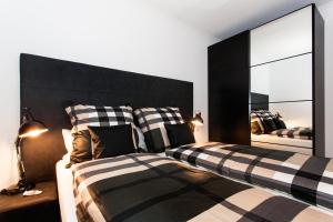 Ένα ή περισσότερα κρεβάτια σε δωμάτιο στο Little Oasis Near Frankfurt