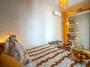 Postel nebo postele na pokoji v ubytování Riad dada Messouda spa