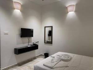 Postel nebo postele na pokoji v ubytování Le Tamara Suite - TIE Hotels & Resorts