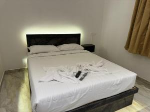 Postel nebo postele na pokoji v ubytování Le Tamara Suite - TIE Hotels & Resorts