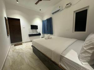 Postel nebo postele na pokoji v ubytování Le Tamara Suite - TIE Hotels & Resorts
