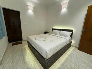 Postel nebo postele na pokoji v ubytování Le Tamara Suite - TIE Hotels & Resorts