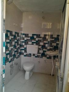 Kopalnica v nastanitvi Satwik Homestay