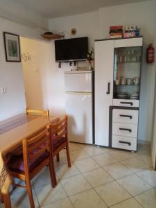 Kuchyň nebo kuchyňský kout v ubytování Apartmani Vitković II Cres + 33 fotografií