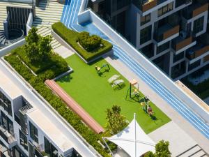 an overhead view of a park on a building at Skypark Laguna Rooftop Pool Apartment near Bang Tao Beach in Bang Tao Beach