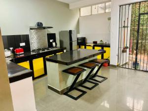 a kitchen with a island in the middle of it at House for Rent -Near Colombo in Gampaha
