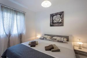 Cama o camas de una habitación en Ferienwohnung für 4 Personen ca 32 qm in Funtana, Istrien Istrische Riviera