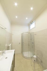 a bathroom with a glass shower and a sink at Ferienwohnung für 4 Personen ca 75 qm in Imperia-Porto Maurizio, Italienische Riviera Italienische Westküste in Imperia