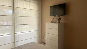 Televízia a/alebo spoločenská miestnosť v ubytovaní luxury homes apt valle del este resort, vera, garrucha,mojacar