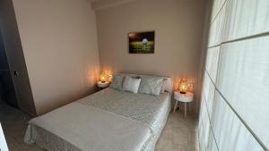 A bed or beds in a room at Luxury Homes Valle Del Este Resort Golf And Spa Vera, Garrucha, Mojacar