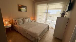 Posteľ alebo postele v izbe v ubytovaní luxury homes apt valle del este resort, vera, garrucha,mojacar + 37 fotografií