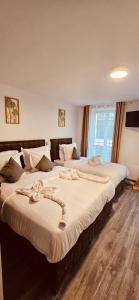 Voodi või voodid majutusasutuse HOTEL FORMIO toas