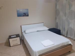 Ένα ή περισσότερα κρεβάτια σε δωμάτιο στο Vlora Apartment