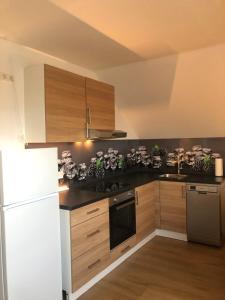 Kuchyň nebo kuchyňský kout v ubytování 4 Zimmer-Komfortwohnung mit viel Platz in Haltern