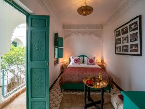 Postel nebo postele na pokoji v ubytování Riad dada Messouda spa