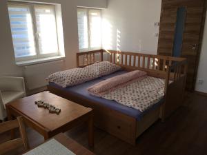 Posteľ alebo postele v izbe v ubytovaní Apartmány Crystalindo