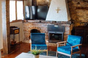 Et tv og/eller underholdning på APARTAMENTOS EL CORITU