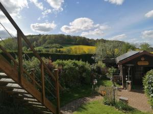 a view of the garden from the house at Ferienwohnung Waldblick in Bad Essen