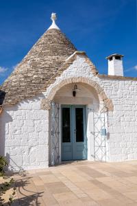 Fotografie z fotogalerie ubytování Trullo Dimora Podere Papilio v Noci