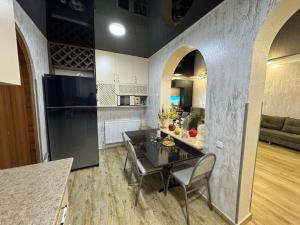 Η κουζίνα ή μικρή κουζίνα στο Ios Guest House