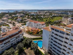 an aerial view of the apartment buildings and a pool at Holiferias Amoreira Mar in Alvor