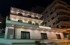 a building with a sign that reads kings hotel at Kanes Boutique Hotel in Sarandë