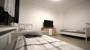 Ein Bett oder Betten in einem Zimmer der Unterkunft Maye Oberhausen City Deluxe - 1