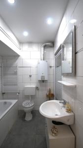 Koupelna v ubytování Maye Oberhausen City Deluxe - 1