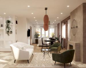 sala de estar con sofá blanco y sillas en Twin Houses Residence, en Tirana