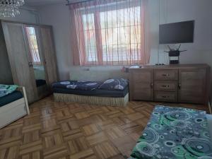Postel nebo postele na pokoji v ubytování Apartmán Modré z nebe