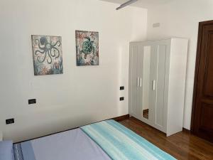 A bed or beds in a room at Casa Camilla