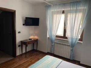 A television and/or entertainment centre at Casa Camilla