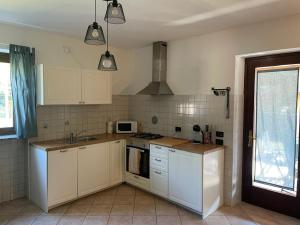 A kitchen or kitchenette at Casa Camilla