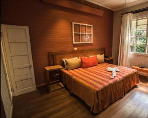 Ένα ή περισσότερα κρεβάτια σε δωμάτιο στο Hotel Aranjuez