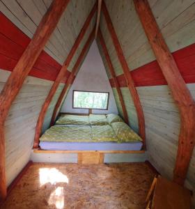 Postel nebo postele na pokoji v ubytování Cabin 4 Hill Station